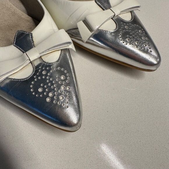 Stuart Weitzman Whiskerlo Pointed Toe Flats in White Patent Leather with Silver - Picture 8 of 11